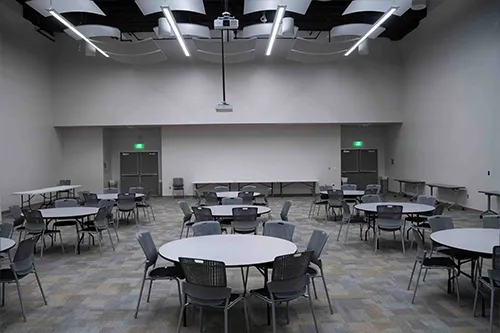 Rundell Hall Conference Center: Back of room with tables and chairs