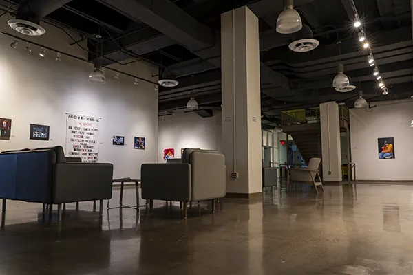 Artwork on walls with comfortable seating